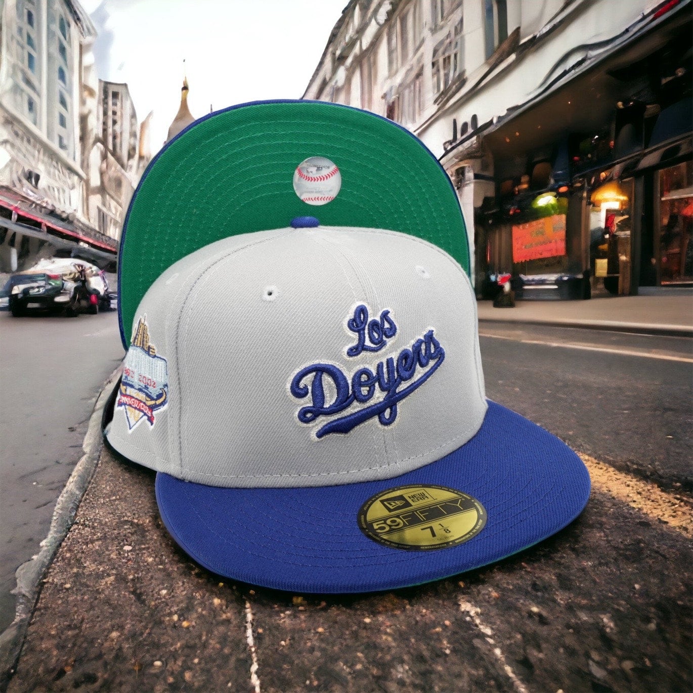 blue fitted hat with patch