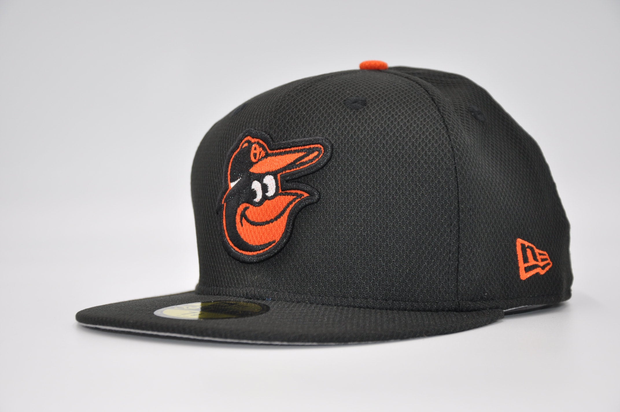 Baltimore Orioles New Era All Black With Orange New Era Logo On The Side  Diamond Era 59FIFTY Fitted Hat