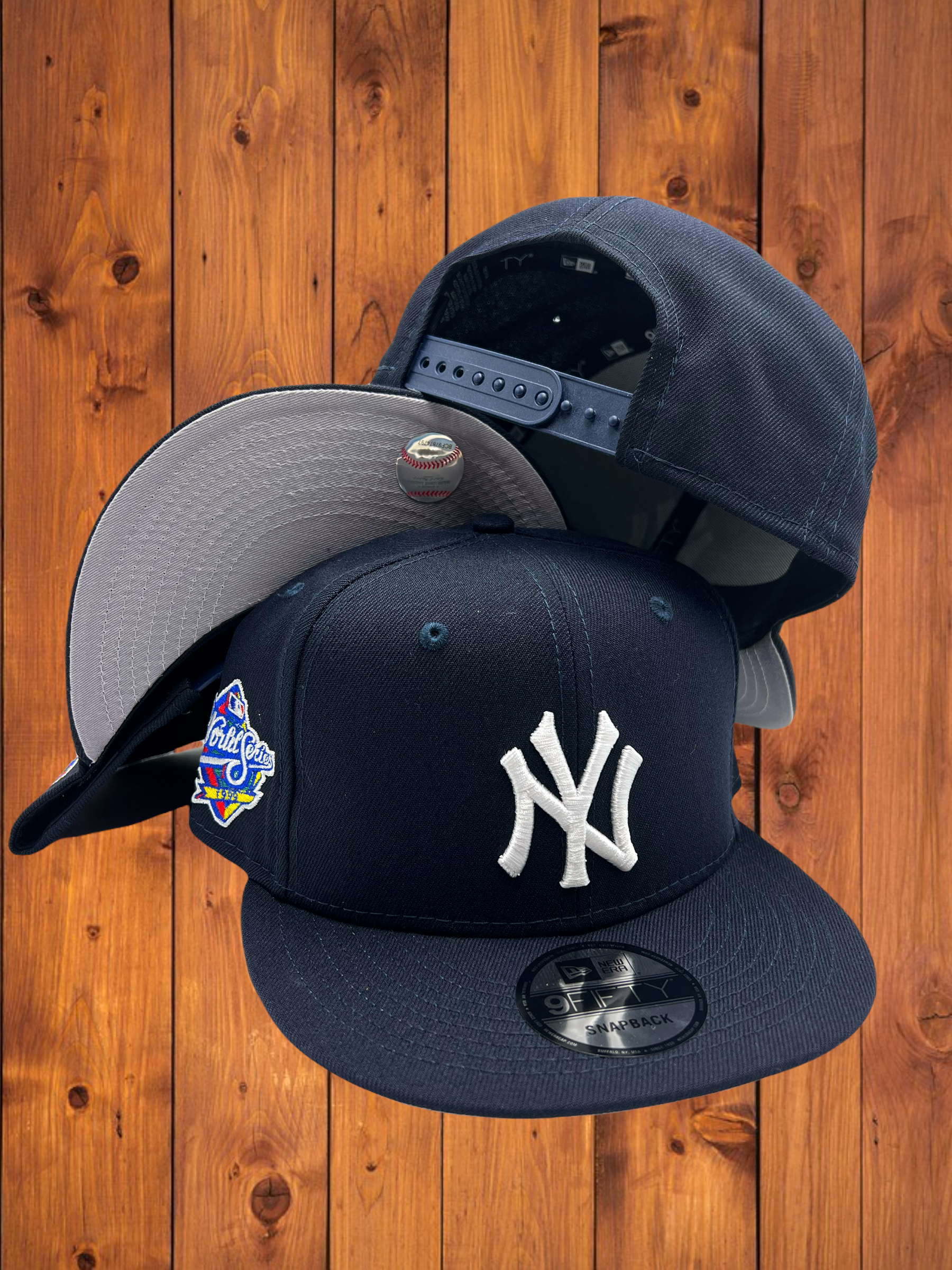 Yankees 99 WS New Era 59FIFTY Black Fitted Hat Royal Blue Bottom